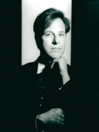 Dr. Francisco Silva at the piano