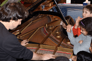 Dr. Silva conducting the piano tour for beginners.