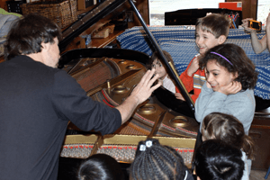 Dr. Silva conducting the piano tour for beginners.