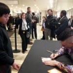 Cameron Carpenter autographs for David.