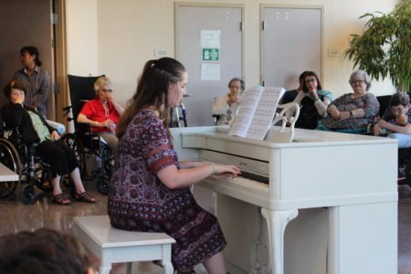 Lucy performs at senior center