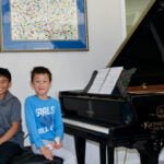 Vincent and Lucas at the piano