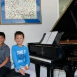 Vincent and Lucas at the piano